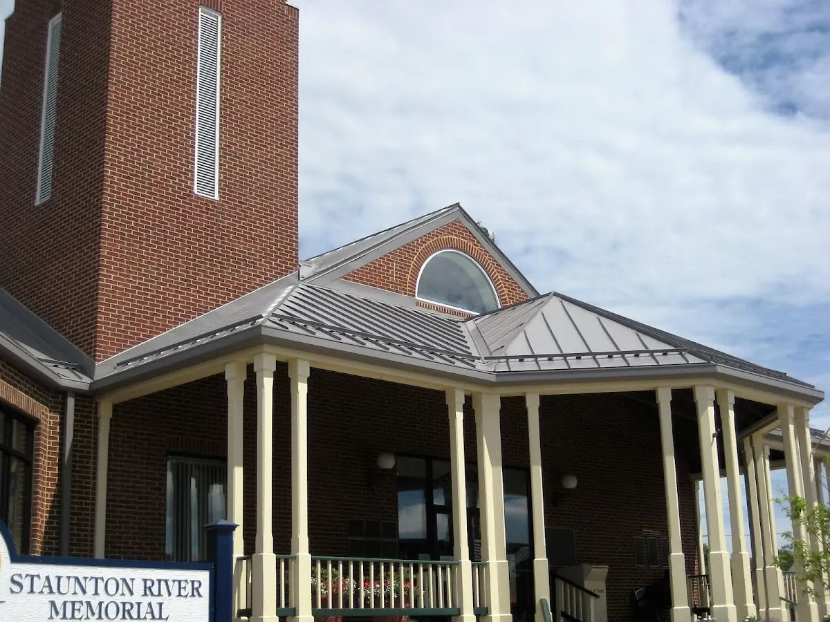 Skilled roofing craftsmen working on a residential roof in Orlovista
